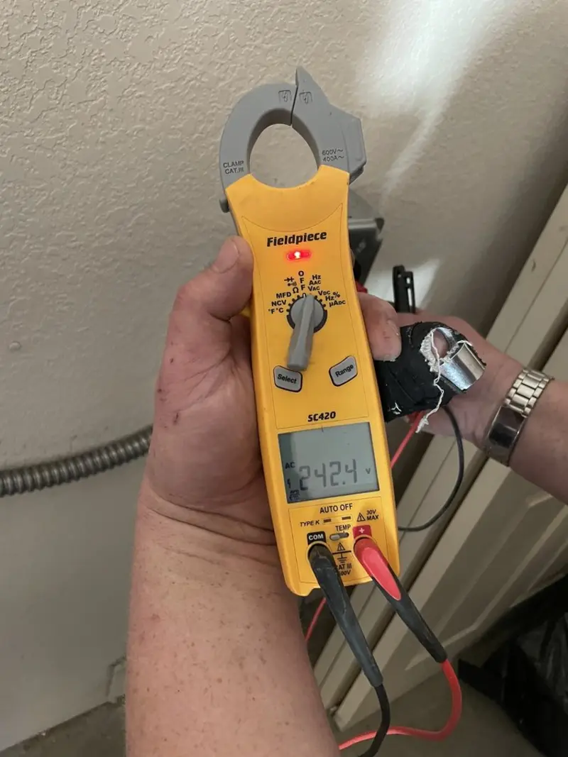 Voltage testing with clamp meter during Aluminum Wiring Replacement in Des Moines